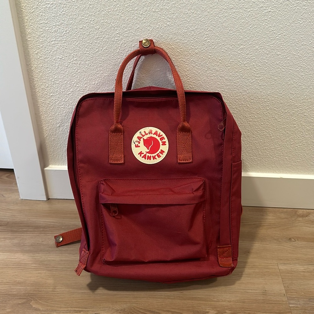 Brick Fjallraven backpack.